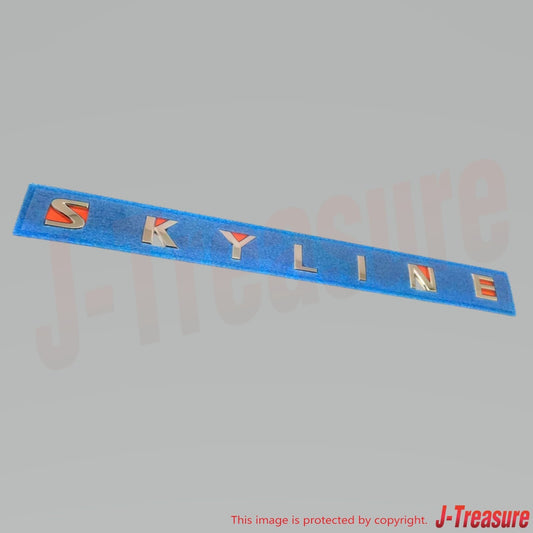 NISSAN SKYLINE V35 COUPE 03-07 Genuine Trunk Lid Emblem "SKYLINE" 84895-AM900