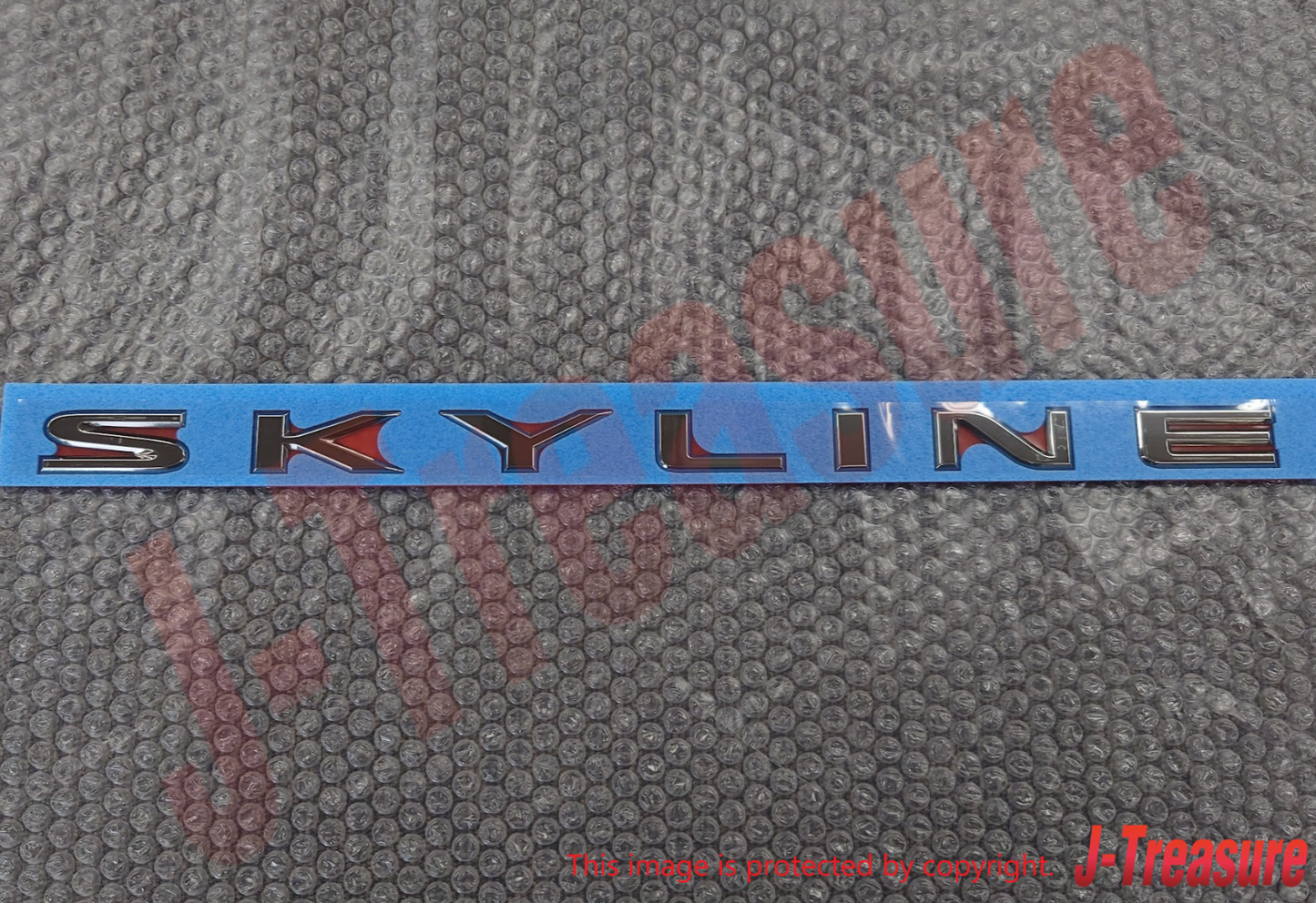 NISSAN SKYLINE R34 1998-2000 Genuine Trunk Lid Emblem "SKYLINE" 84895-AA100 OEM