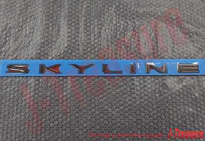 NISSAN SKYLINE R34 1998-2000 Genuine Trunk Lid Emblem "SKYLINE" 84895-AA100 OEM