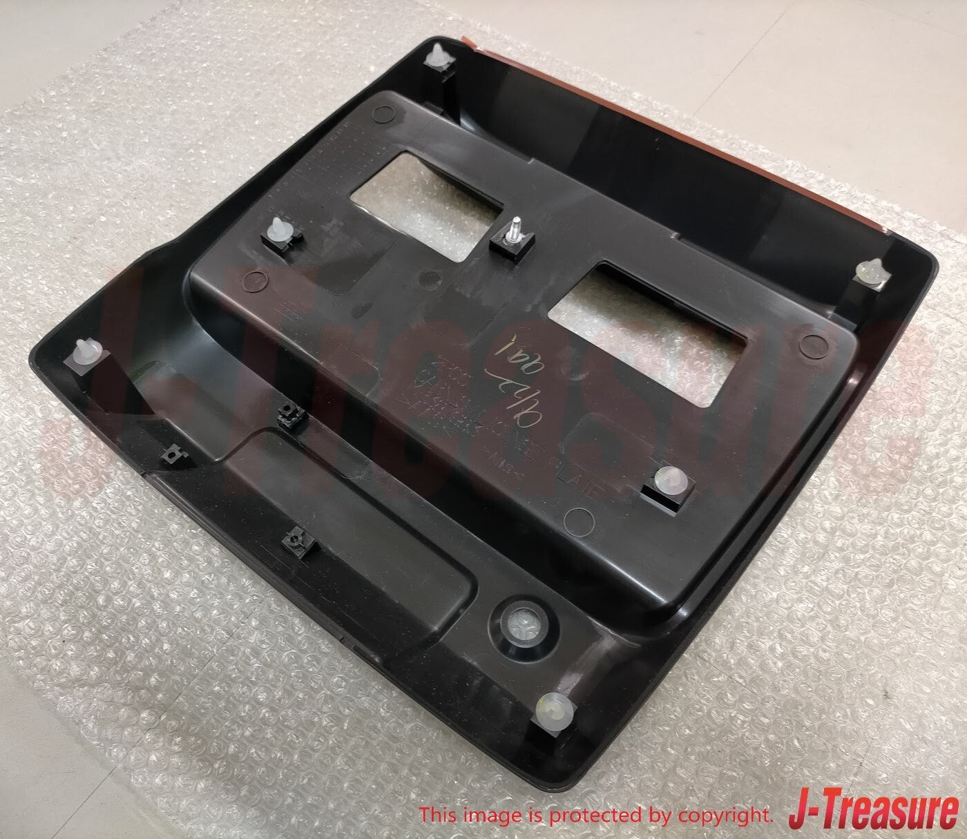 MITSUBISHI MONTERO V6#W V7#W 01-06 Genuine Back Door License Plate Garnish OEM
